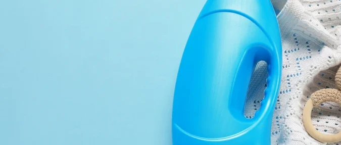 Construction worker applying tile adhesive on wall